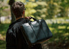 black leather zippered briefcase with lifetime warranty