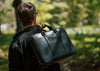 black leather zippered briefcase with lifetime warranty